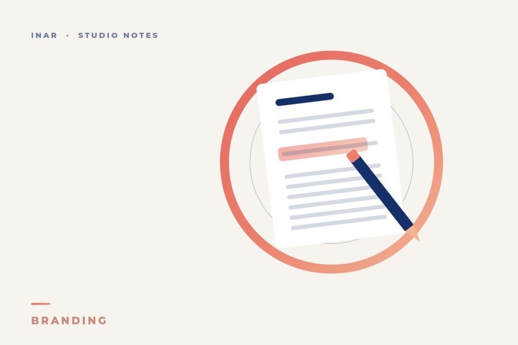 A design brief sheet with a highlighted line and a pencil